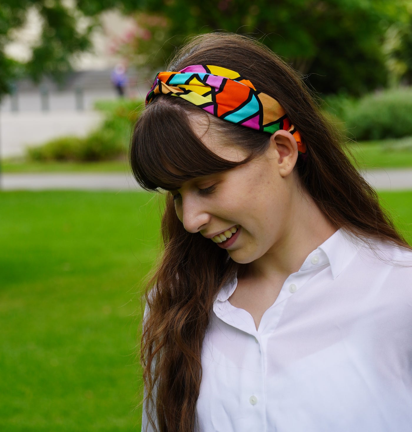 Girl wears colourful silk headband